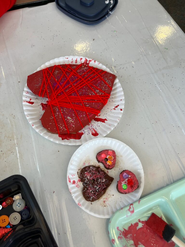 Artwork and artists from the February 2023 — Cinnamon Applesauce Valentines Ornaments session at Creating With Blind Abandon.