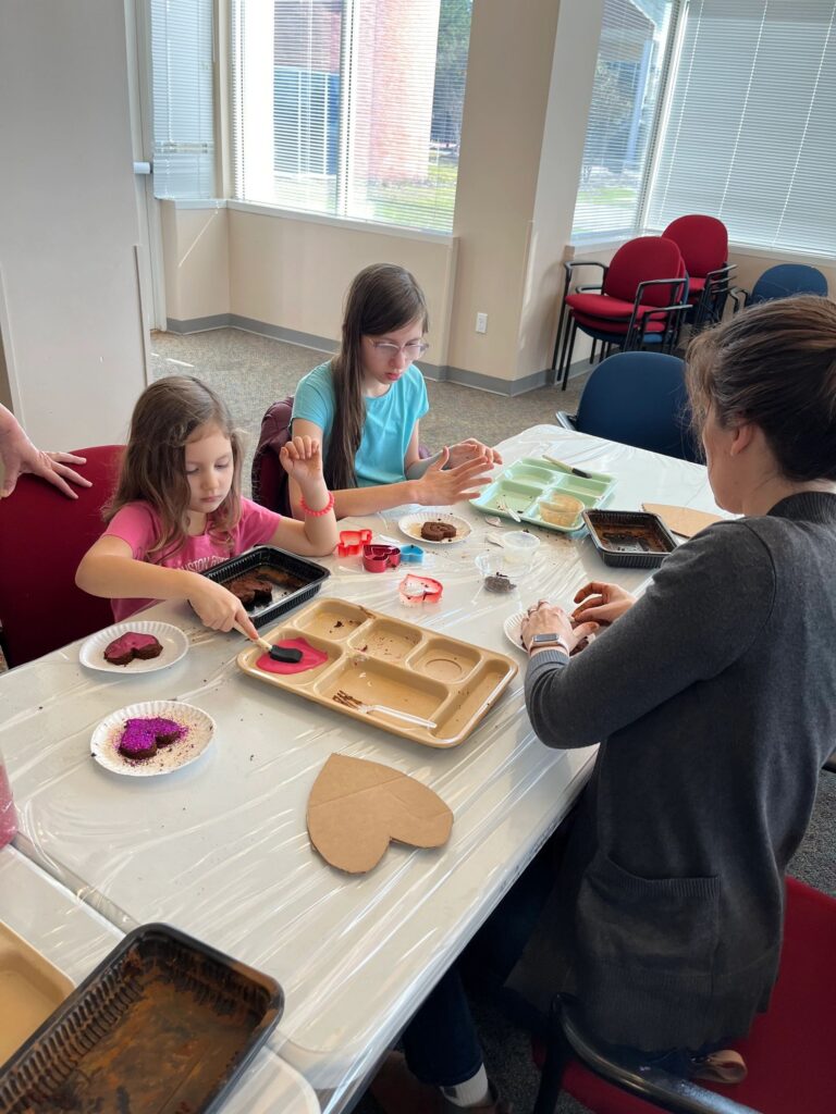 Artwork and artists from the February 2023 — Cinnamon Applesauce Valentines Ornaments session at Creating With Blind Abandon.
