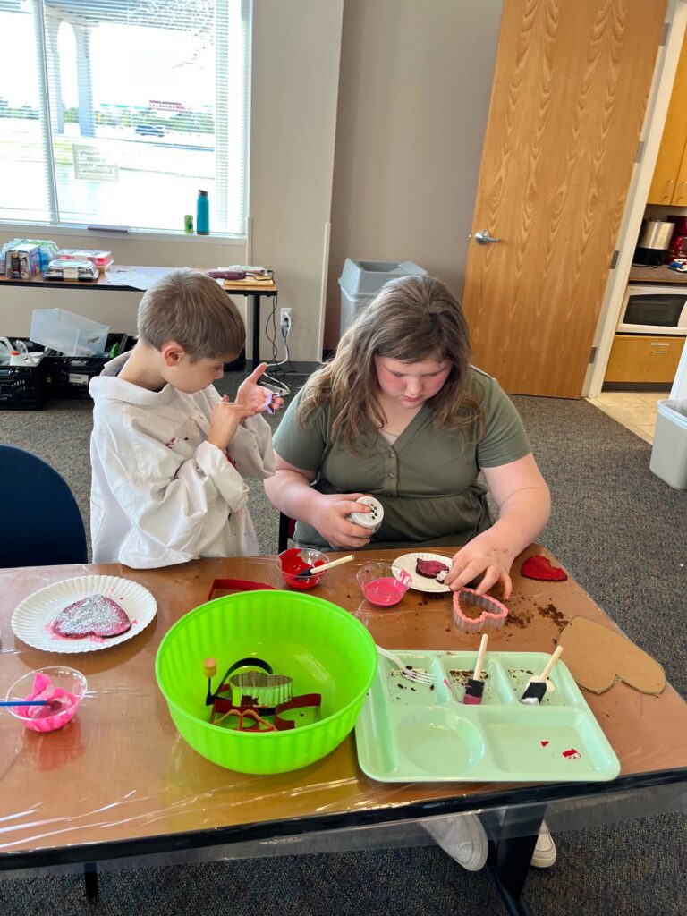 Artwork and artists from the February 2023 — Cinnamon Applesauce Valentines Ornaments session at Creating With Blind Abandon.